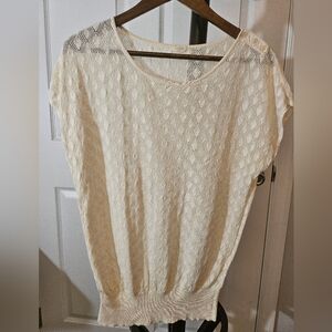 JCrew womens, cream, knit top with button embellishment on left shoulder.